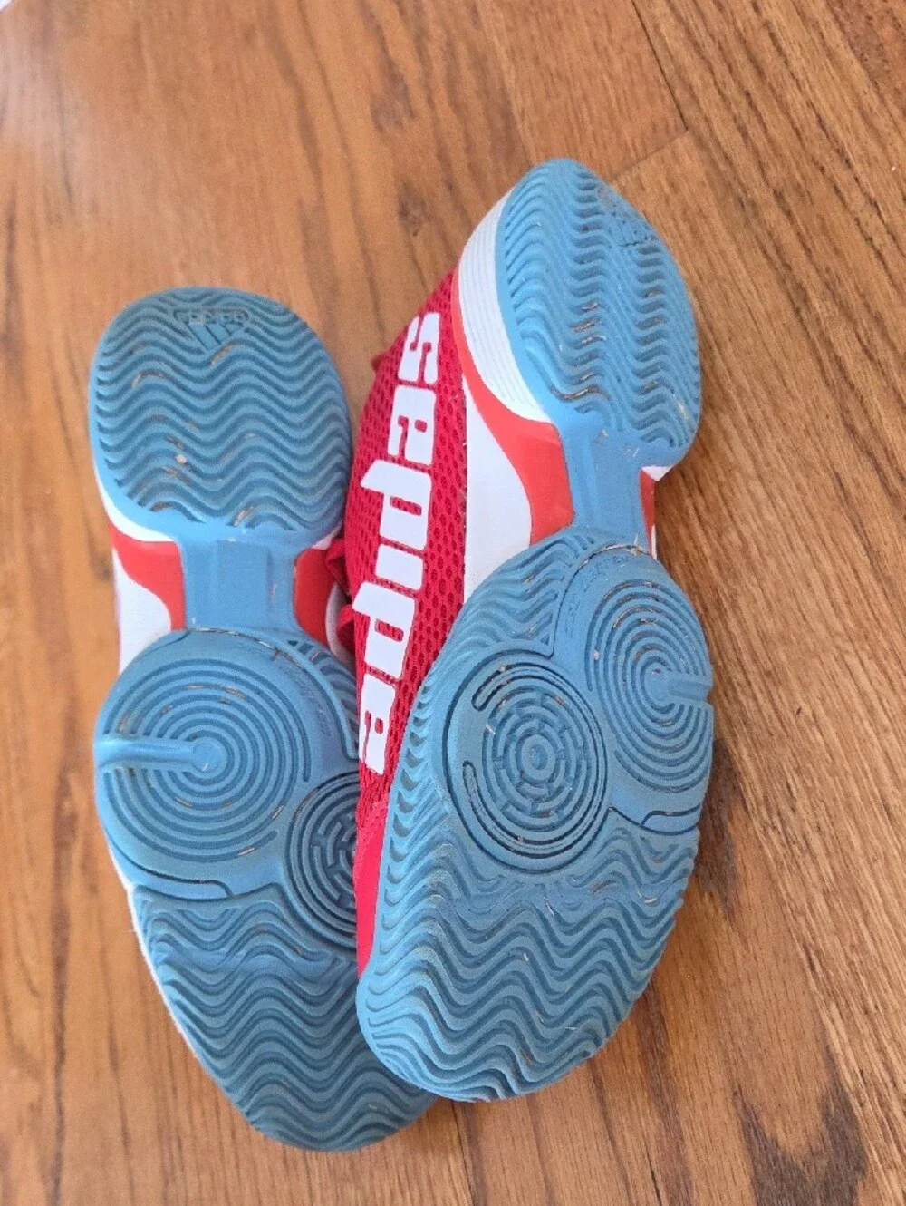Red ADIDAS Tennis Shoes with Blue Soles